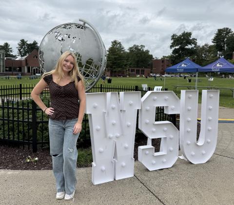 student leader on green