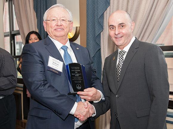 William Hackenson receiving his hall of fame trophy