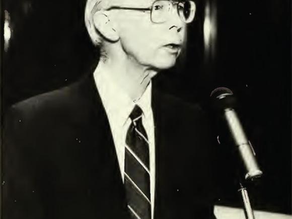 John F. Nevin accepts the Outstanding Educator award in 1993.