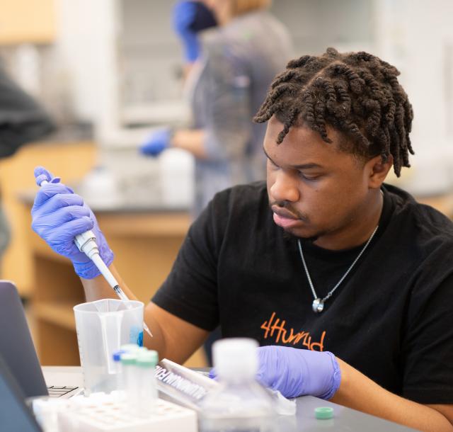 Student praticing micropipetting